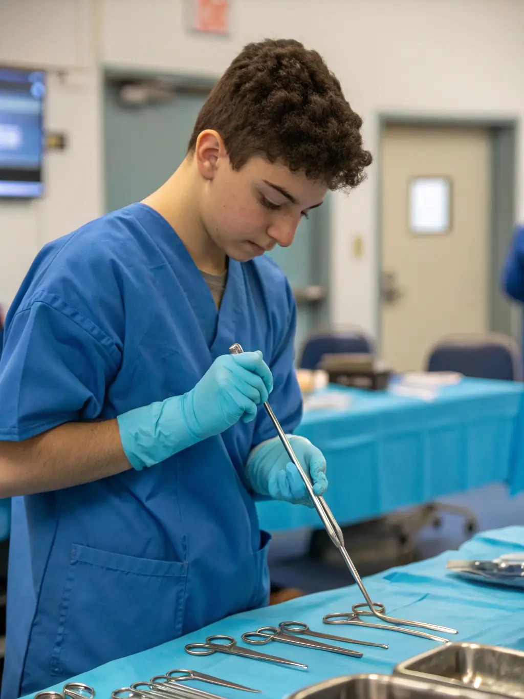 A healthcare professional participating in a SterileOps training session, learning about the latest techniques and best practices in sterile processing.
